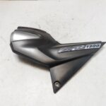 cache lateral gauche