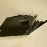 Cache avant gauche réservoir